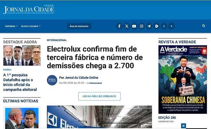 Captura de tela do site Jornal da Cidade Online exibindo a manchete “Electrolux confirma fim de terceira fábrica e número de demissões chega a 2.700”, publicada em 5 de agosto de 2026, na seção Internacional.